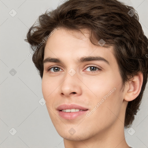 Joyful white young-adult male with medium  brown hair and brown eyes