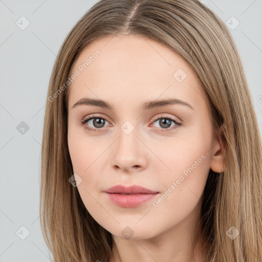 Neutral white young-adult female with long  brown hair and brown eyes