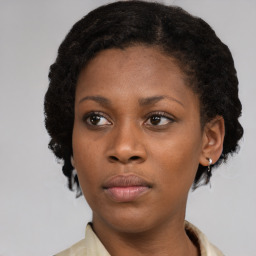 Neutral black young-adult female with short  brown hair and brown eyes