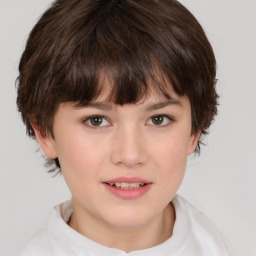 Joyful white child female with medium  brown hair and brown eyes