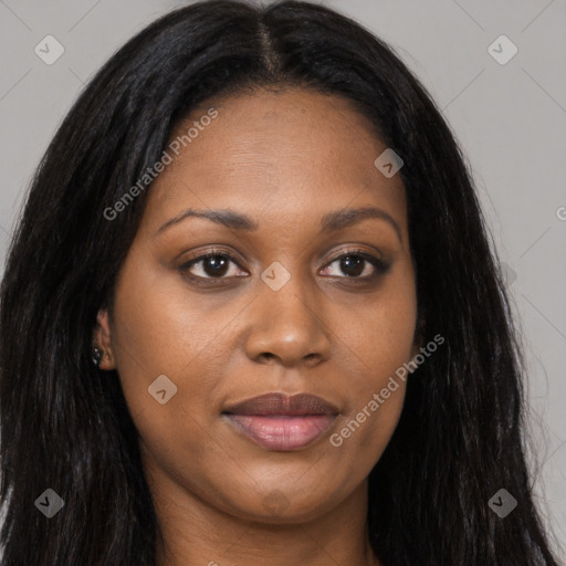 Joyful black young-adult female with long  brown hair and brown eyes