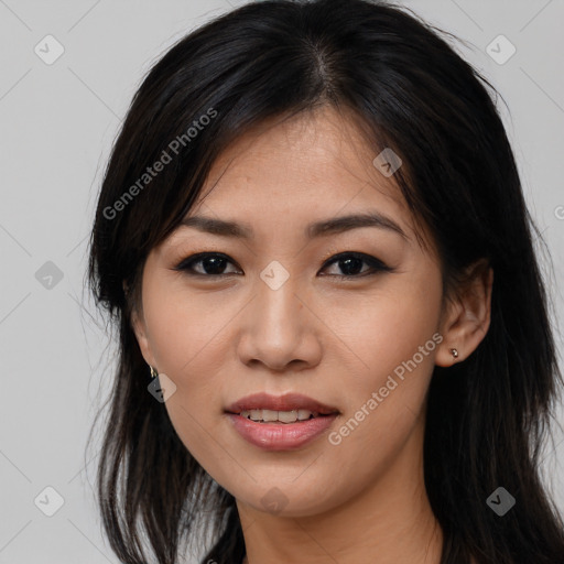 Joyful asian young-adult female with long  brown hair and brown eyes