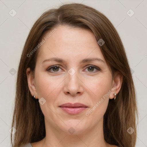 Joyful white adult female with long  brown hair and grey eyes