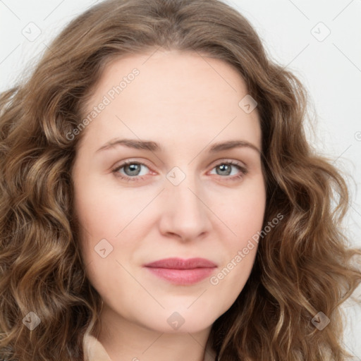 Joyful white young-adult female with long  brown hair and green eyes