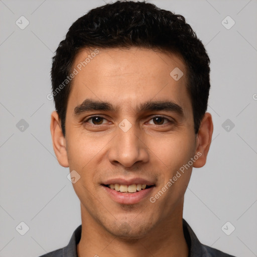 Joyful white young-adult male with short  black hair and brown eyes