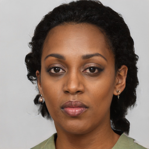 Neutral black young-adult female with long  black hair and brown eyes