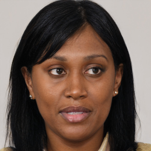 Joyful asian young-adult female with medium  black hair and brown eyes