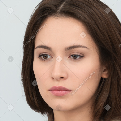 Neutral white young-adult female with long  brown hair and brown eyes