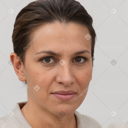 Joyful white adult female with short  brown hair and brown eyes