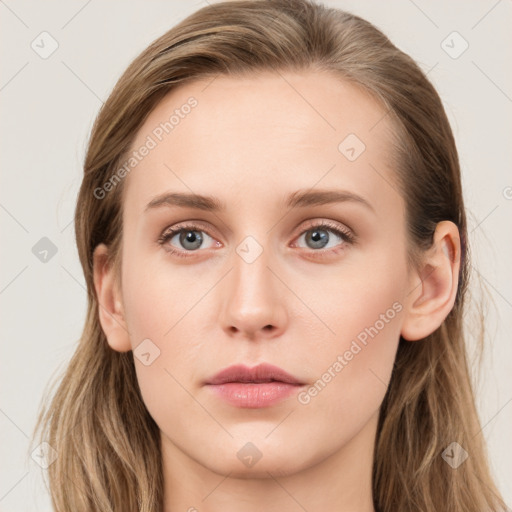 Neutral white young-adult female with long  brown hair and blue eyes