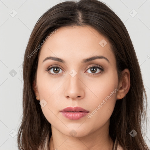 Neutral white young-adult female with long  brown hair and brown eyes