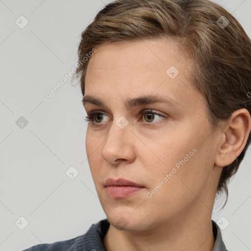 Neutral white young-adult female with medium  brown hair and brown eyes