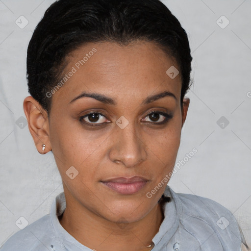 Joyful latino young-adult female with short  brown hair and brown eyes