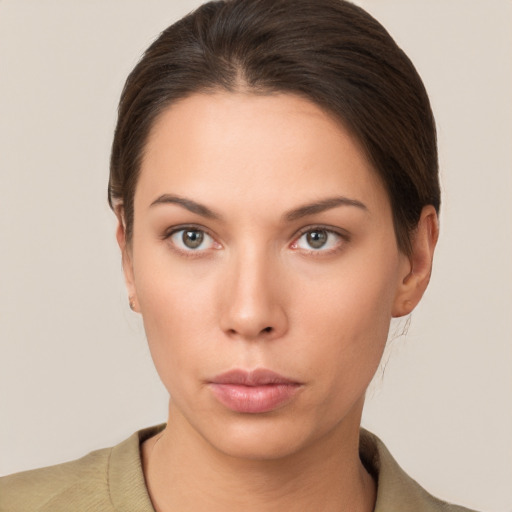 Neutral white young-adult female with short  brown hair and brown eyes