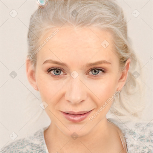 Joyful white adult female with medium  brown hair and blue eyes