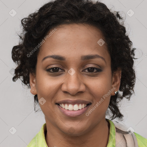 Joyful black young-adult female with short  brown hair and brown eyes