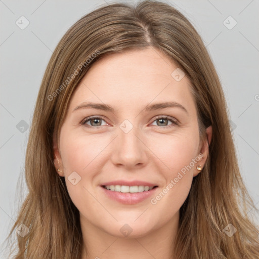 Joyful white young-adult female with long  brown hair and grey eyes