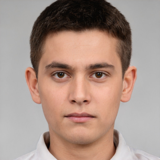 Neutral white young-adult male with short  brown hair and brown eyes