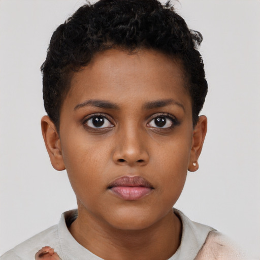Neutral black child female with short  brown hair and brown eyes