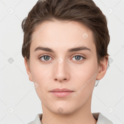 Neutral white young-adult female with short  brown hair and brown eyes