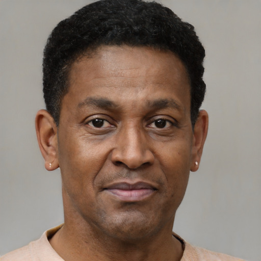Neutral black adult male with short  brown hair and brown eyes