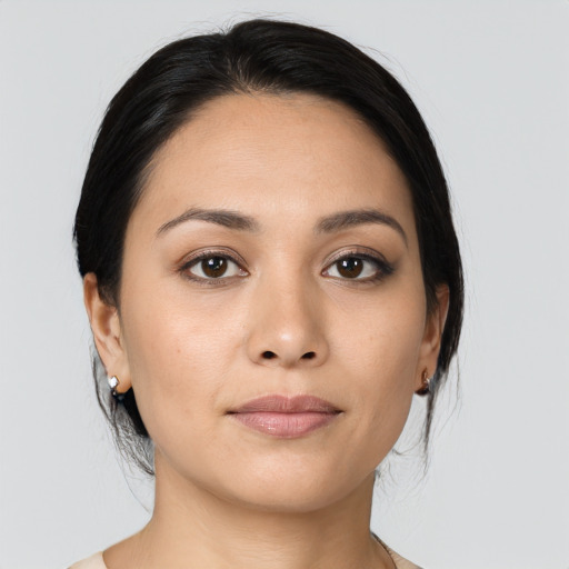Joyful asian young-adult female with medium  black hair and brown eyes
