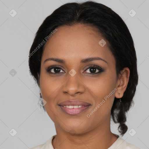 Joyful black young-adult female with medium  black hair and brown eyes