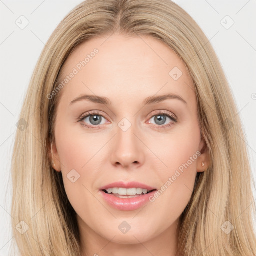 Joyful white young-adult female with long  brown hair and blue eyes