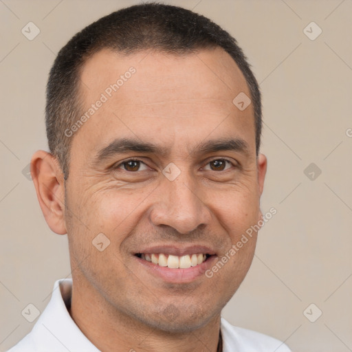 Joyful white adult male with short  brown hair and brown eyes