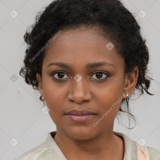 Joyful black young-adult female with long  brown hair and brown eyes