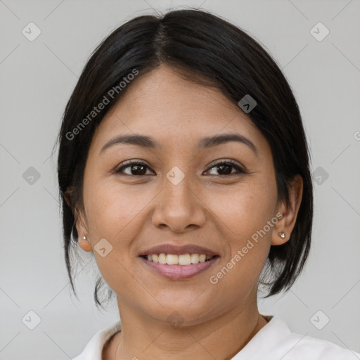 Joyful asian young-adult female with medium  brown hair and brown eyes