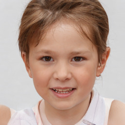 Joyful white child female with short  brown hair and brown eyes
