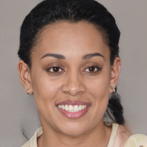 Joyful latino young-adult female with short  brown hair and brown eyes