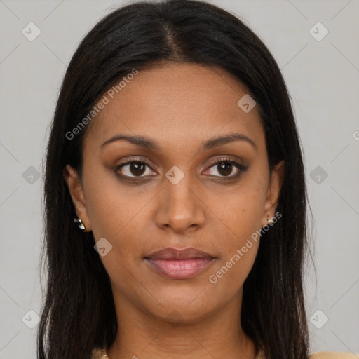 Joyful black young-adult female with long  brown hair and brown eyes