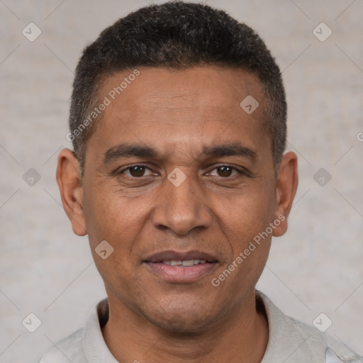 Joyful white adult male with short  black hair and brown eyes