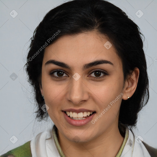 Joyful latino young-adult female with medium  brown hair and brown eyes