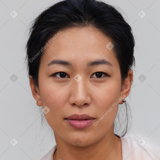 Joyful asian young-adult female with medium  brown hair and brown eyes