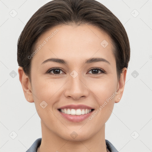 Joyful white young-adult female with short  brown hair and brown eyes