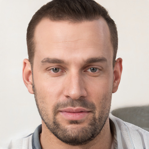 Neutral white young-adult male with short  brown hair and brown eyes