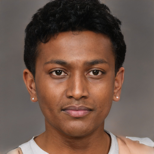 Neutral black young-adult male with short  black hair and brown eyes