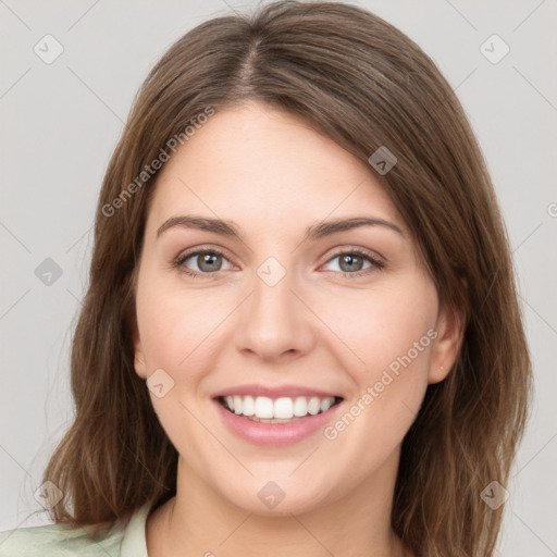 Joyful white young-adult female with medium  brown hair and green eyes