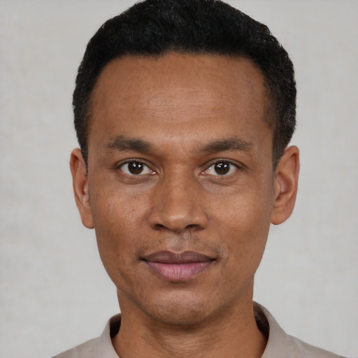 Neutral black young-adult male with short  black hair and brown eyes