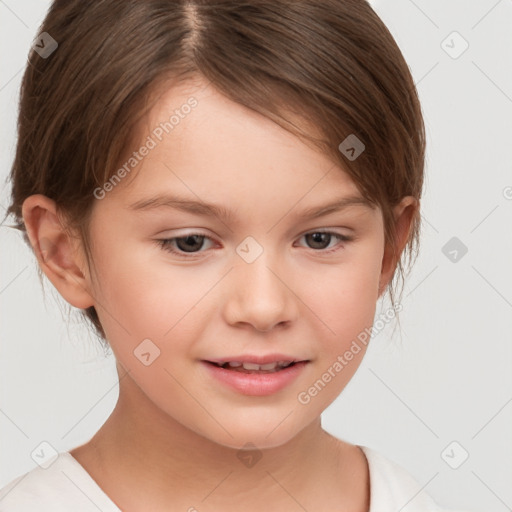 Joyful white child female with short  brown hair and brown eyes