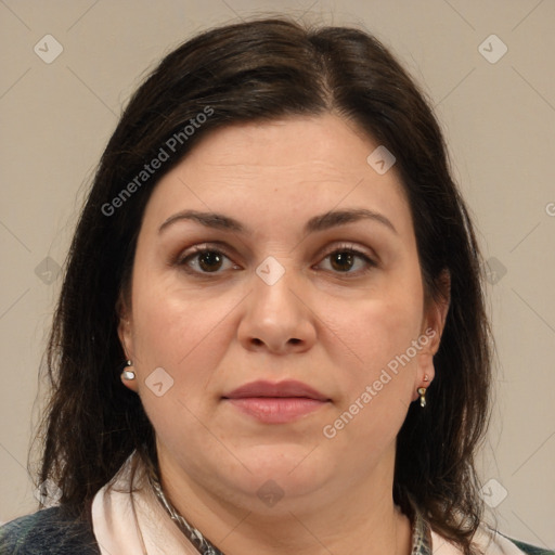 Joyful white adult female with medium  brown hair and brown eyes