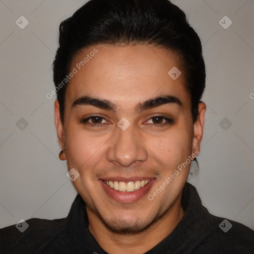 Joyful white young-adult male with short  black hair and brown eyes