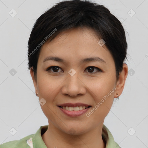 Joyful asian young-adult female with short  brown hair and brown eyes