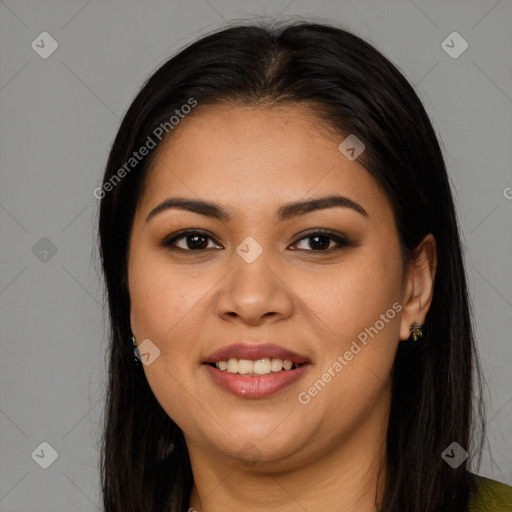 Joyful latino young-adult female with long  brown hair and brown eyes