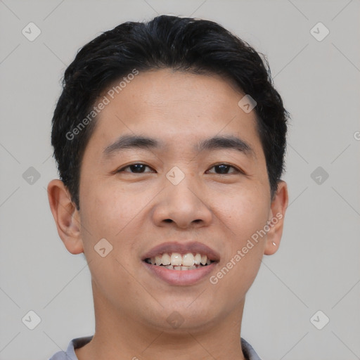 Joyful asian young-adult male with short  black hair and brown eyes