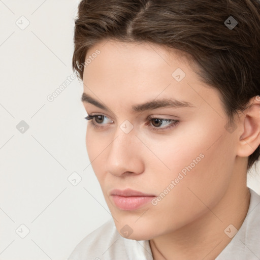 Neutral white young-adult female with short  brown hair and brown eyes