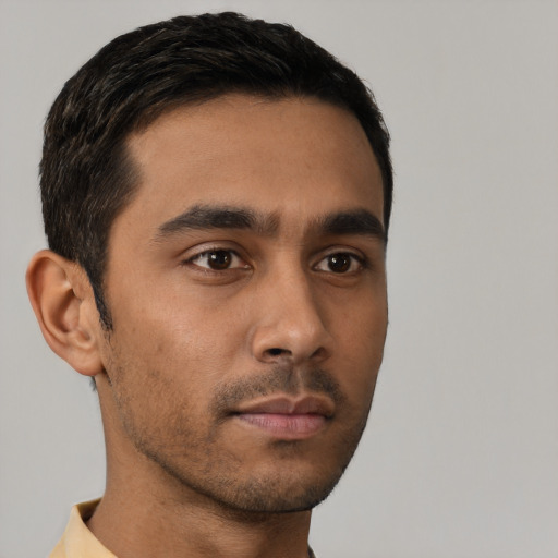 Neutral latino young-adult male with short  black hair and brown eyes